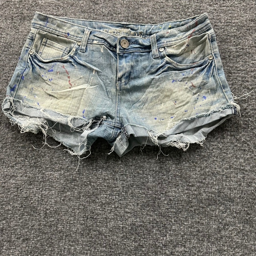 Almost Famous Denim Shorts Womens Size 7 Blue Paint Splatter Raw Hem Casual Y2K